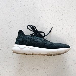 adidas tubular black shoes.